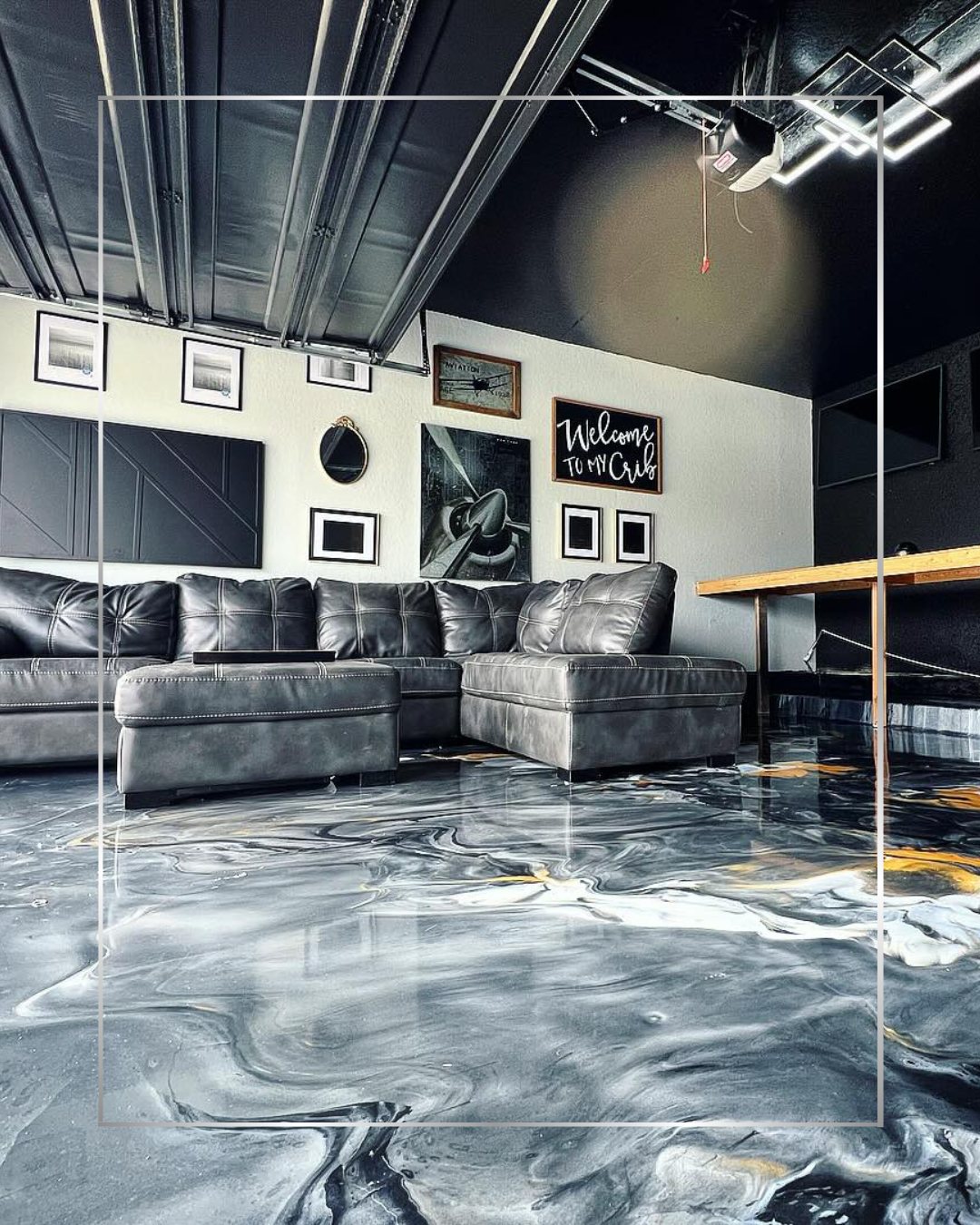 Silver and charcoal metallic epoxy floor in a living room